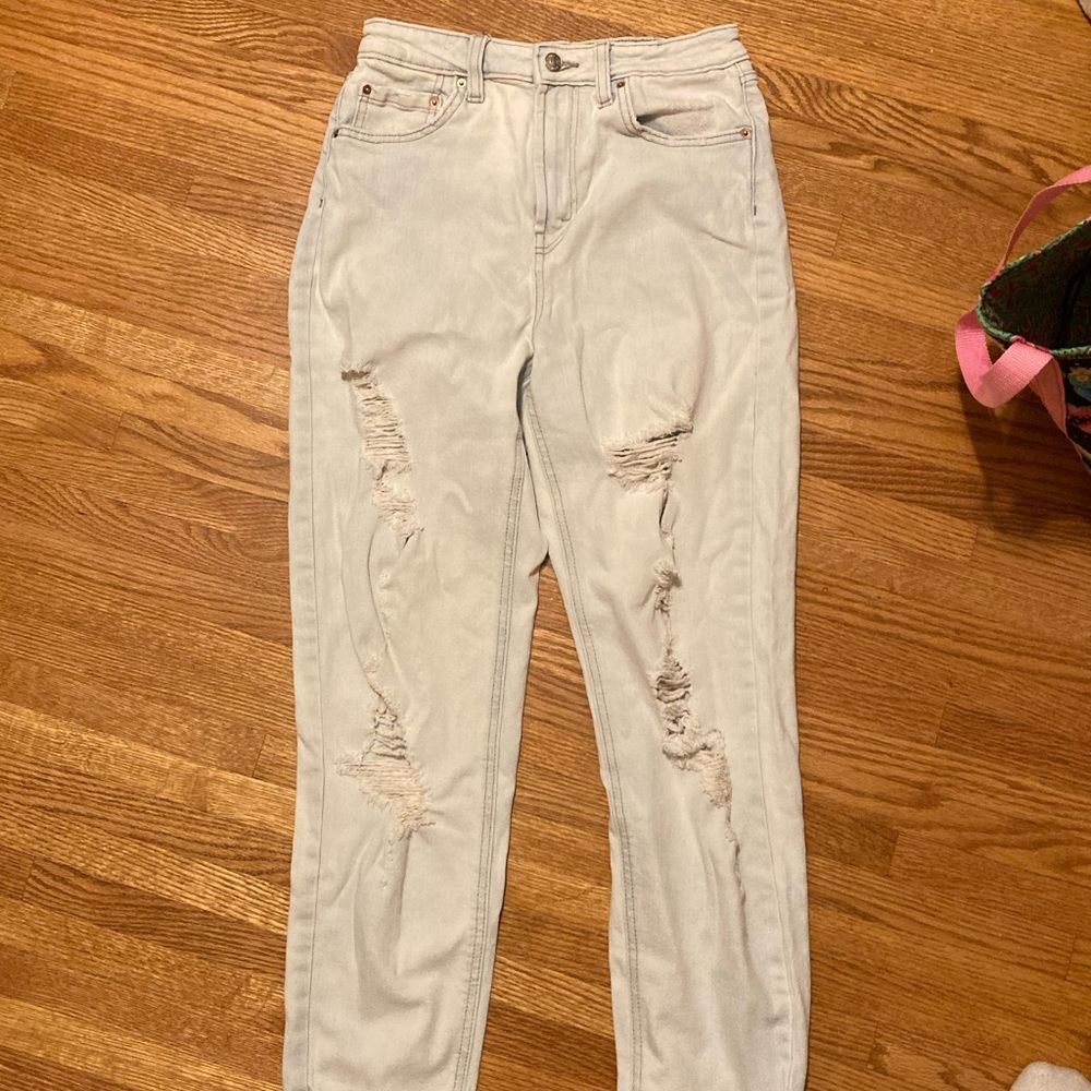 high-rise light wash ripped mom jeans
